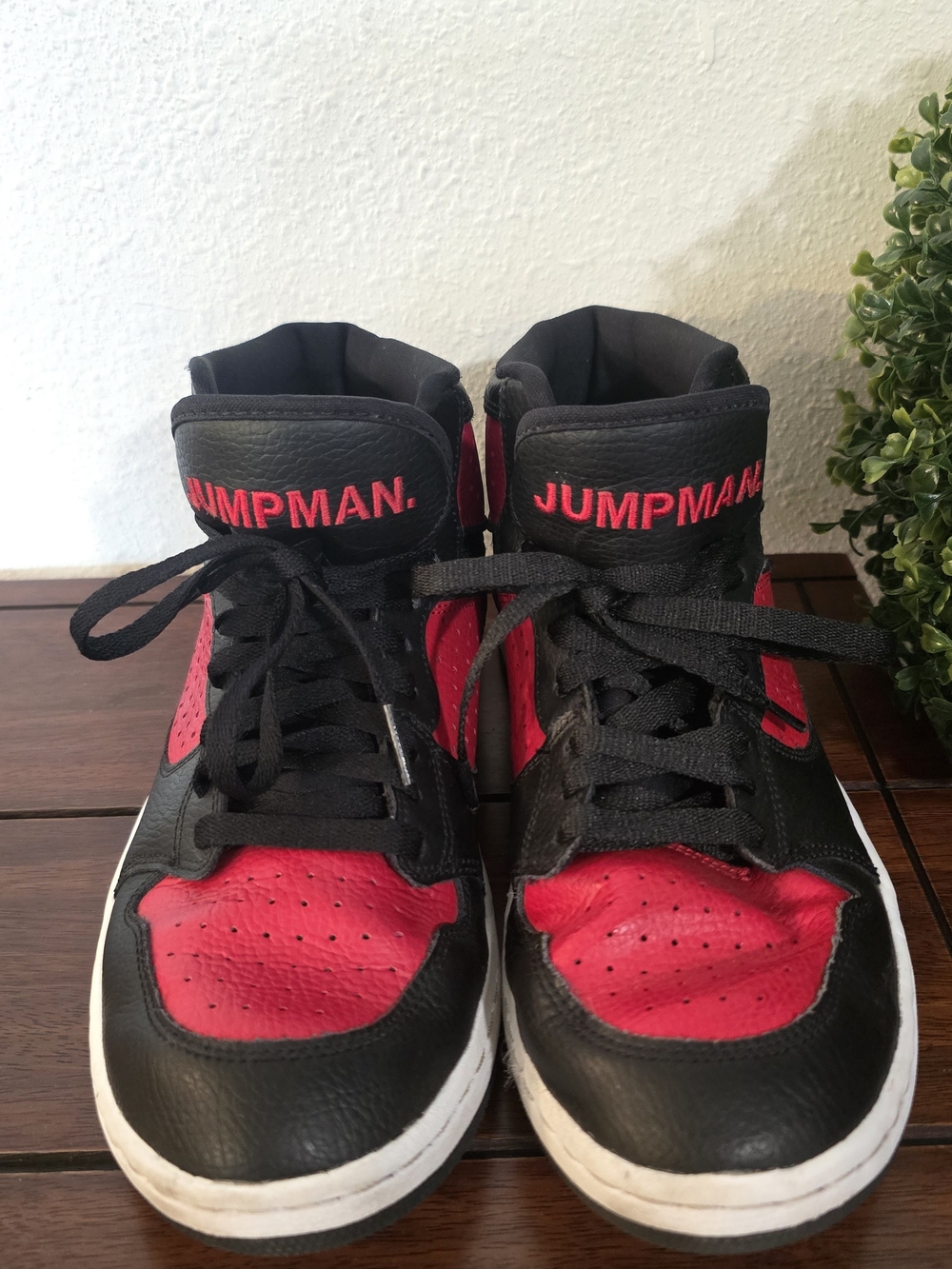 Nike Air Jordan Jumpman Black and Red High-Top Athletic Sneakers
